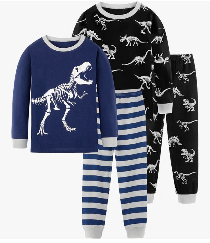 Two kids dinosaur pajama sets, navy and black prints